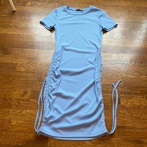 This side draw string dress is a pastel blue and from SHEIN